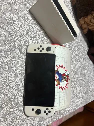 Nintendo switch oled 64gb standard cor preto e branco