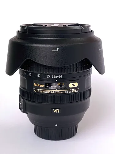 Objetiva Nikon 24-120mm f/4 VR. Linda! Impecável! Sem uso.