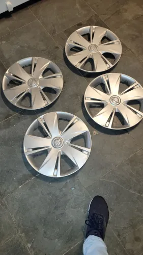 Jogo calotas original nissan march versa aro 14