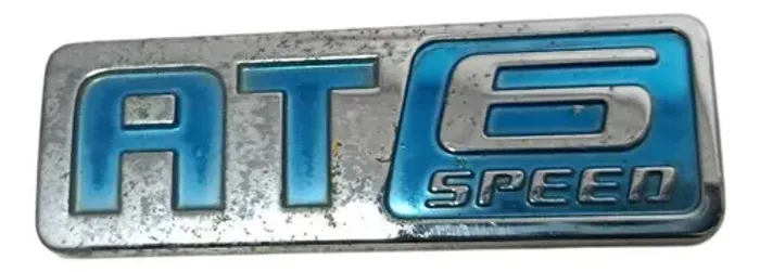 Emblema At6 Speed Spin 2013 A 2016 Cromado Com Azul