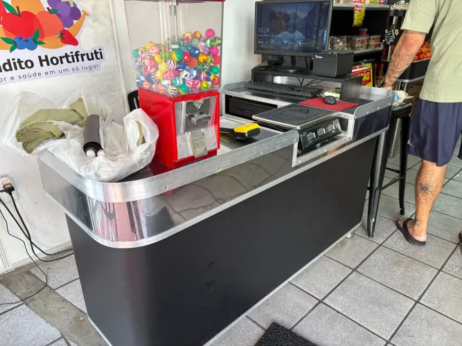 Caixa de supermercado hortifruti check out