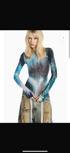 Tig nova blusa!
