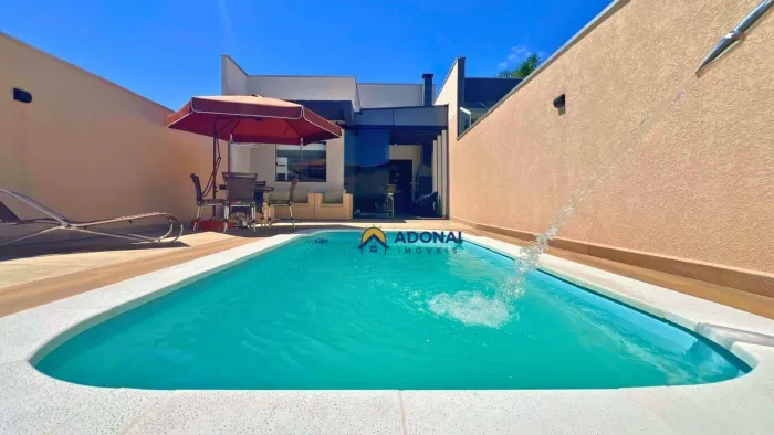 Casa com Piscina, 3 dormitórios à venda, 126 m² por R$ 1.100.000 - Nereidas - Guaratuba/PR