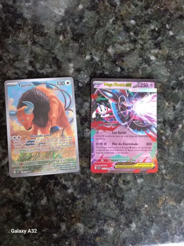 Duas cartas mega-evolução, Mega Floette Ex e Tauros