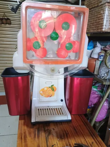 Extrator de suco de laranja automático