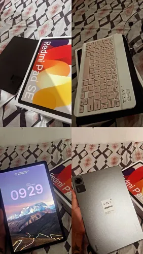 TABLET ACOMPANHA , CAIXA, TECLADO, MAUSE, CARREGADOR E SUPORTE PARA APOIAR.