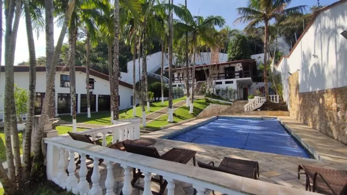 Casa na praia com piscina aquecida, sauna, hidromassagem, salão de jogos, ar condicionado