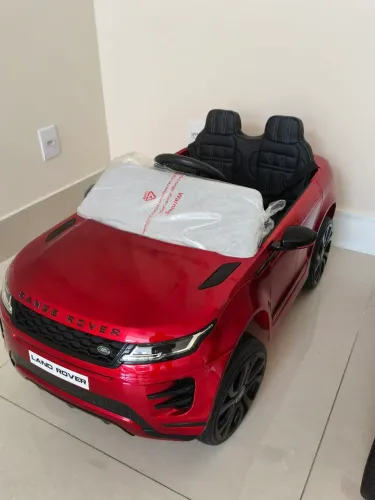 Carrinho Elétrico Infantil Land Rover Linha Premium com pneus em borracha, dvd, couro, 4x4