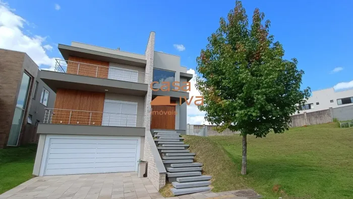 Casa de alto padrão com 4 suítes no Alphaville Gravataí - 335m², mobiliada e com piscina a