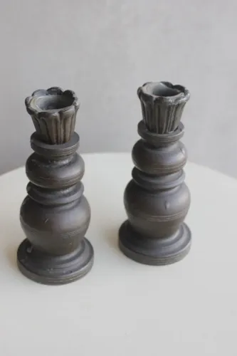 Par de castiçais em bronze
