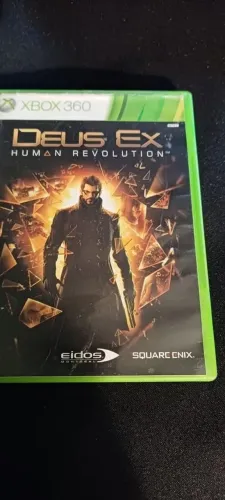 deus ex. human revolution. jogo xbox 360. (midia física/CD)