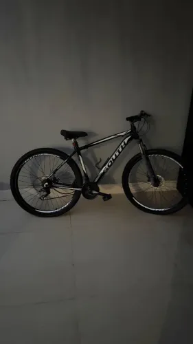 Bicicleta usada pneu novo