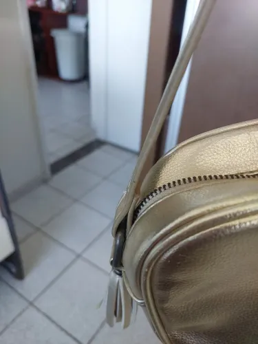 Bolsa tiracolo dourada
