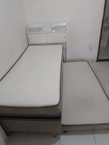 Cama box com auxiliar e cabeceira baú 