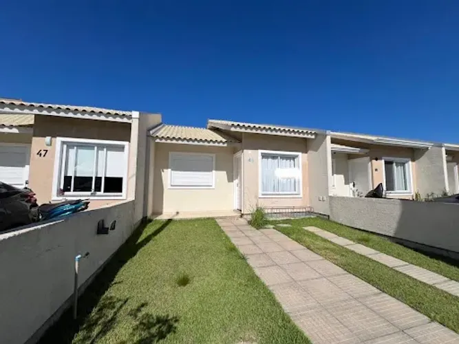 Casa à venda no condomínio Villaggio Blu em Cachoeirinha com 2 quartos, suíte e ótima área