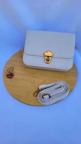 Bolsa off com alça transversal removível e ajustável