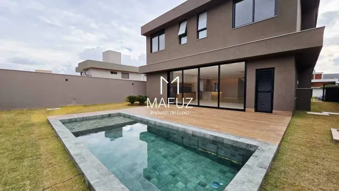 CASA COM AUTOMAÇÃO COMPLETA, LAZER, PISCINA AQUECIDA, ESPAÇO GOURMET E 4 SUÍTES PLANEJADAS