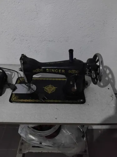 Vendo uma maquina de costura.