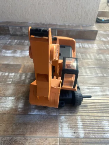 Escavadeira de brinquedo para criança 