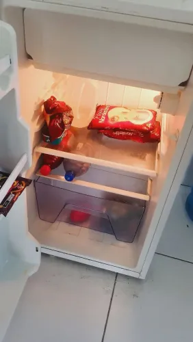 Vendo frigobar bem conservado meu de uso gelando tudo normal luz acende muito bom
