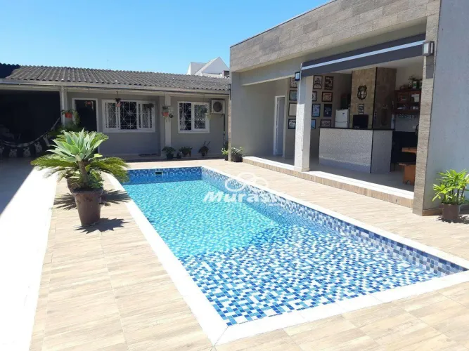 Casa com piscina e 3 quartos à venda, 182 m² por R$ 790.000 - Cohapar - Guaratuba/PR