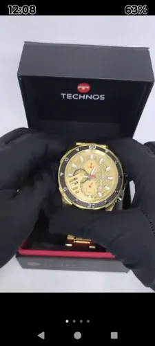 RELÓGIO TECNOS DOURADO NUNCA USADO