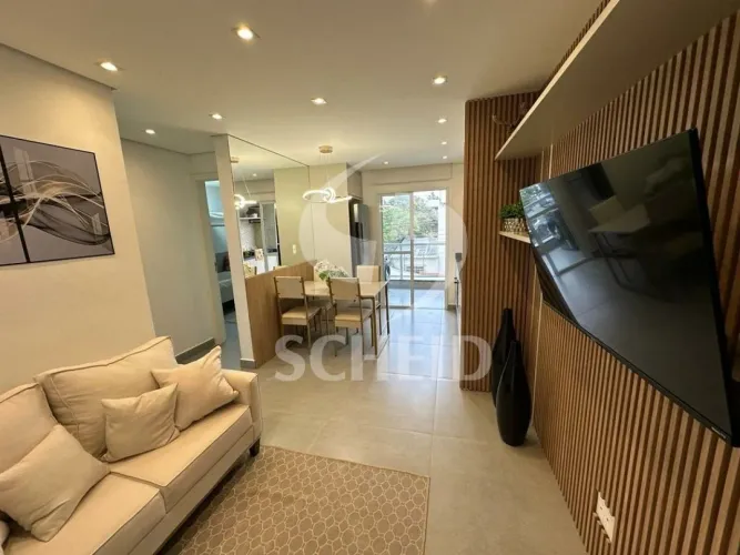 Apartamento mobiliado para locação 2 dormitórios 1 suíte 1 vaga + varanda