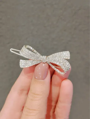 Presilha de cabelo com laço de strass