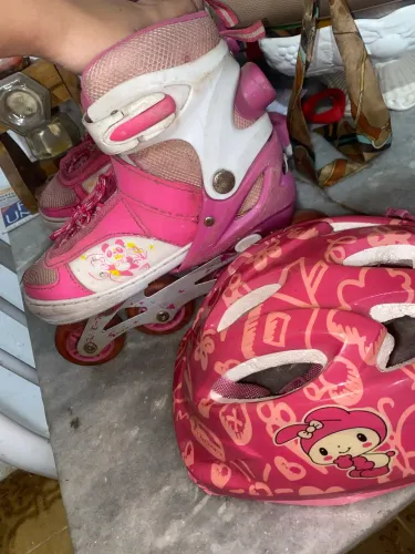 Patinete rosa com proteção