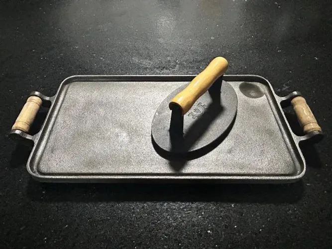Chapa e prensador de ferro fundido