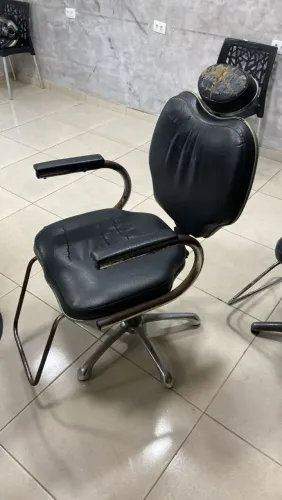 Cadeiras de barbeiro usado