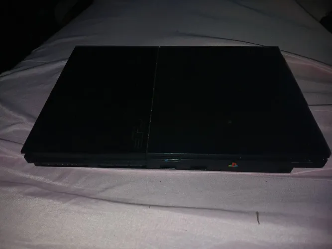 PlayStation 2 quebrado com controle