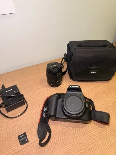 Canon EOS Rebel t100 + lente 18-55mm + bolsa + carregador original