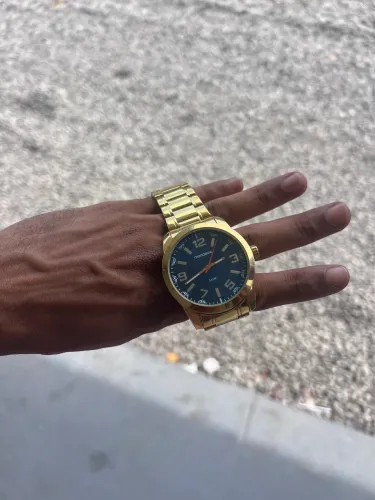 Relógio mondaine dourado original