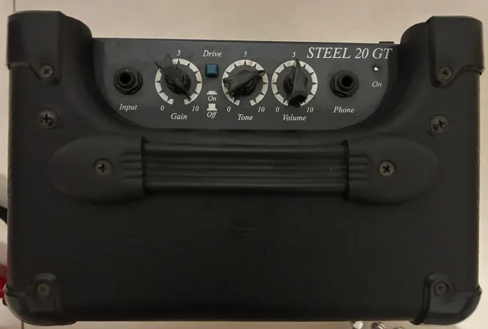 Guitarra Condor + amplificador