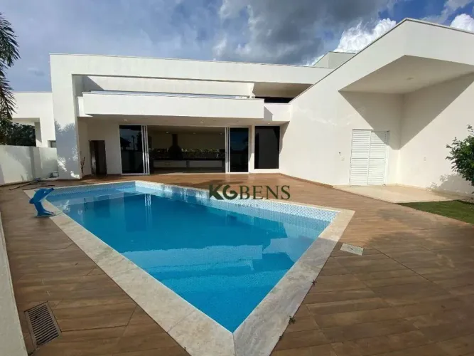 Casa com 3 dormitórios à venda, 430 m² por R$ 3.100.000,00 - Condomínio Athenas - Paulínia