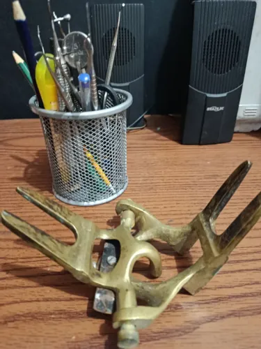 Charneira articulada odontológica