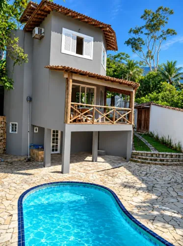 Casa ilhabela 3 suites,piscina, churrasqueira 500m da praia Feiticeira ...temporada!!