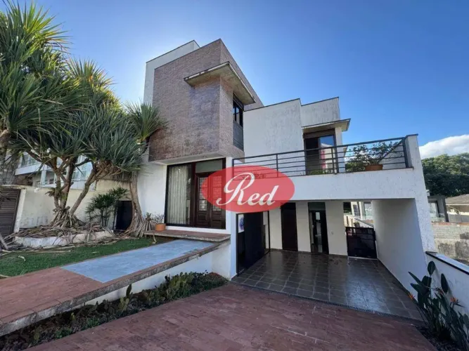 Casa com 3 dormitórios para alugar, 249 m² por R$ 11.543,58/mês - Real Park - Mogi das Cru