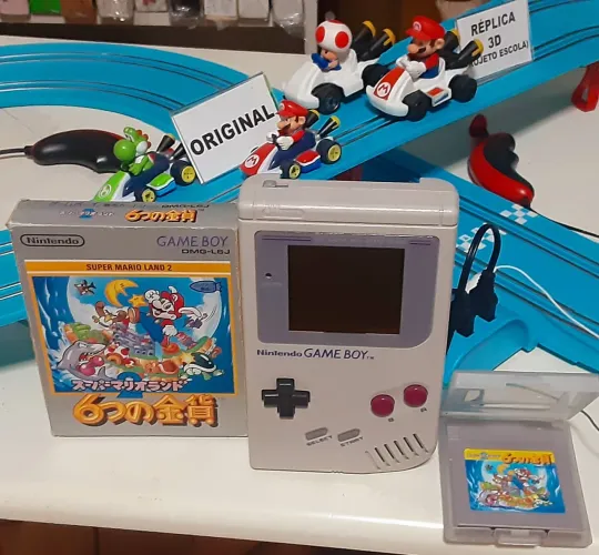 Gameboy original com Jogo na caixa
