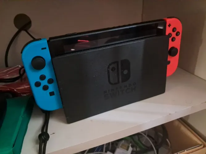 Nintendo switch novo com jogos , troco somente em playstation 4 slim, fat ou pro