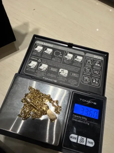 Ouro corrente Cartier maciça e pingente com 15 diamantes