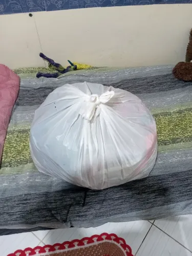 Saco com roupas usadas