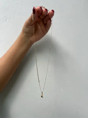 Cordão de ouro com pingente