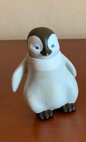 Boneco penguin happy feet