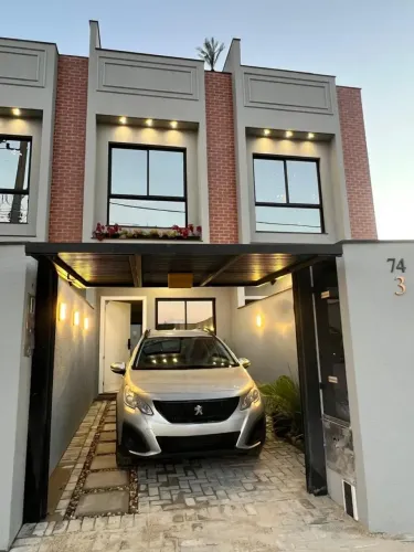 SOBRADO TRIPLEX EM ITAPEMA, COM 02 SUITES., PRONTO PARA MORAR