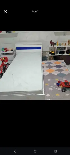 Vendi bi cama com baú e os 2 colchão es estado de novo 1 ainda no plástico 