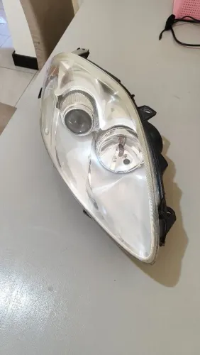 Farol Fiat Bravo LD Carona