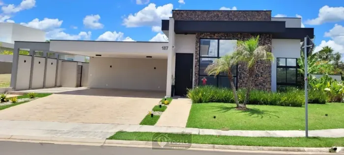 CASA À VENDA NO CONDOMÍNIO TAMBORÉ EM JAGUARIÚNA/SP COM 3 SUÍTES E TERRENO DE 612 M²