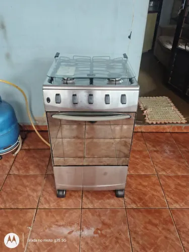 Vendo fogão 4 bocas elétrico funcionando perfeitamente entrego grátis